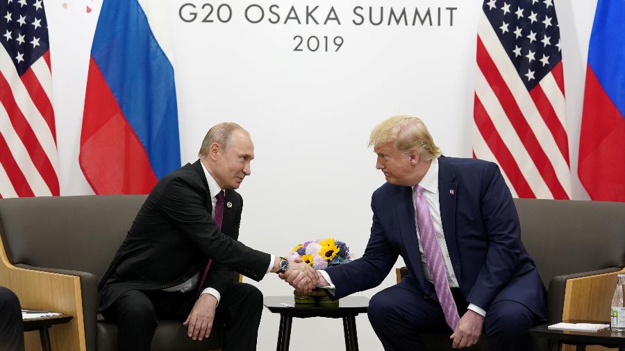 Os presidentes da Rússia, Vladimir Putin , e dos EUA, Donald Trump, se cumprimentam no G20, em Osaka (Japão) Os presidentes da Rússia, Vladimir Putin , e dos EUA, Donald Trump, se cumprimentam no G20, em Osaka (Japão)